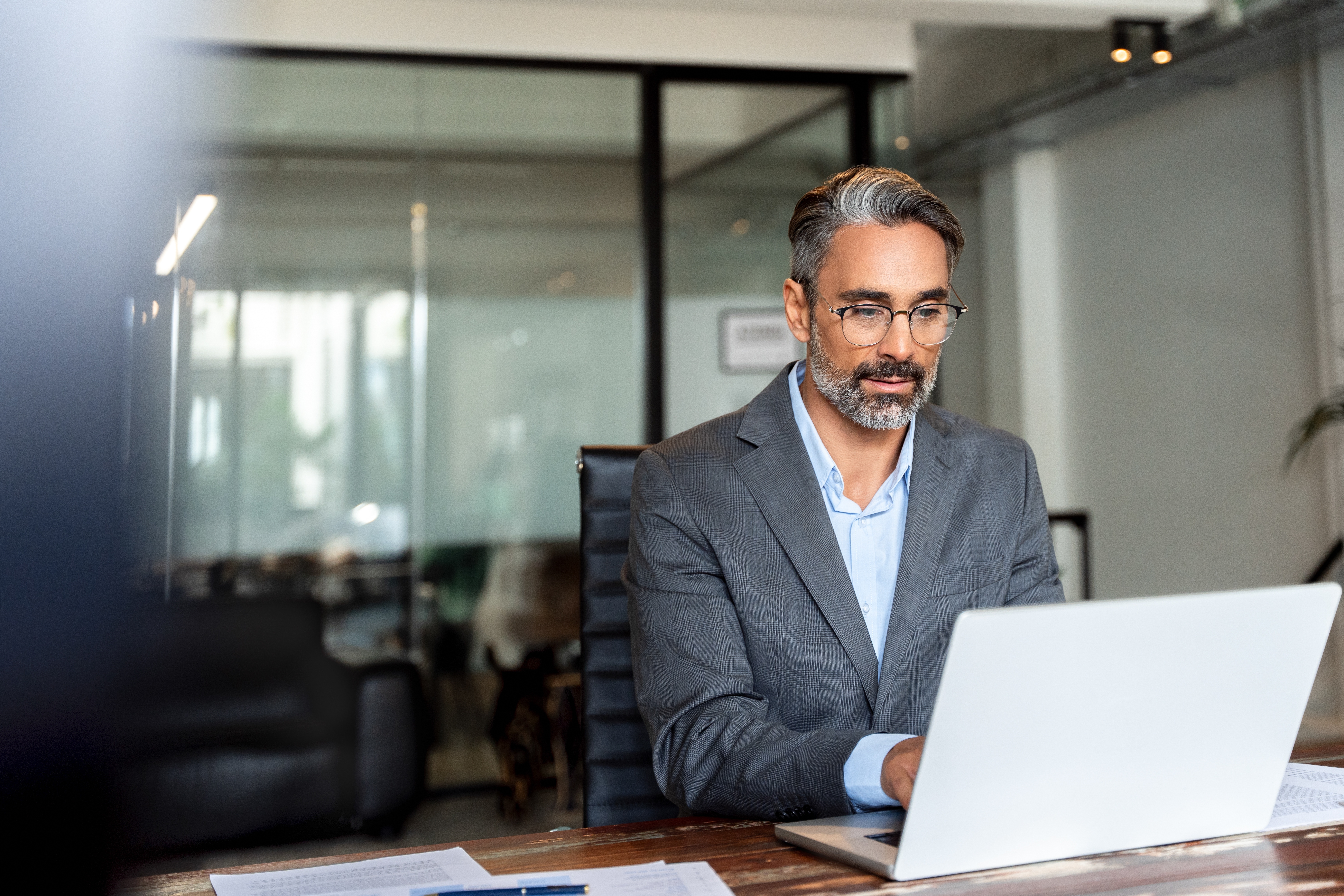 Man on laptop image